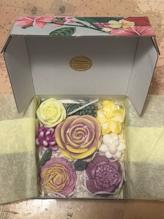 Decorative box with flower candles and wax melts.